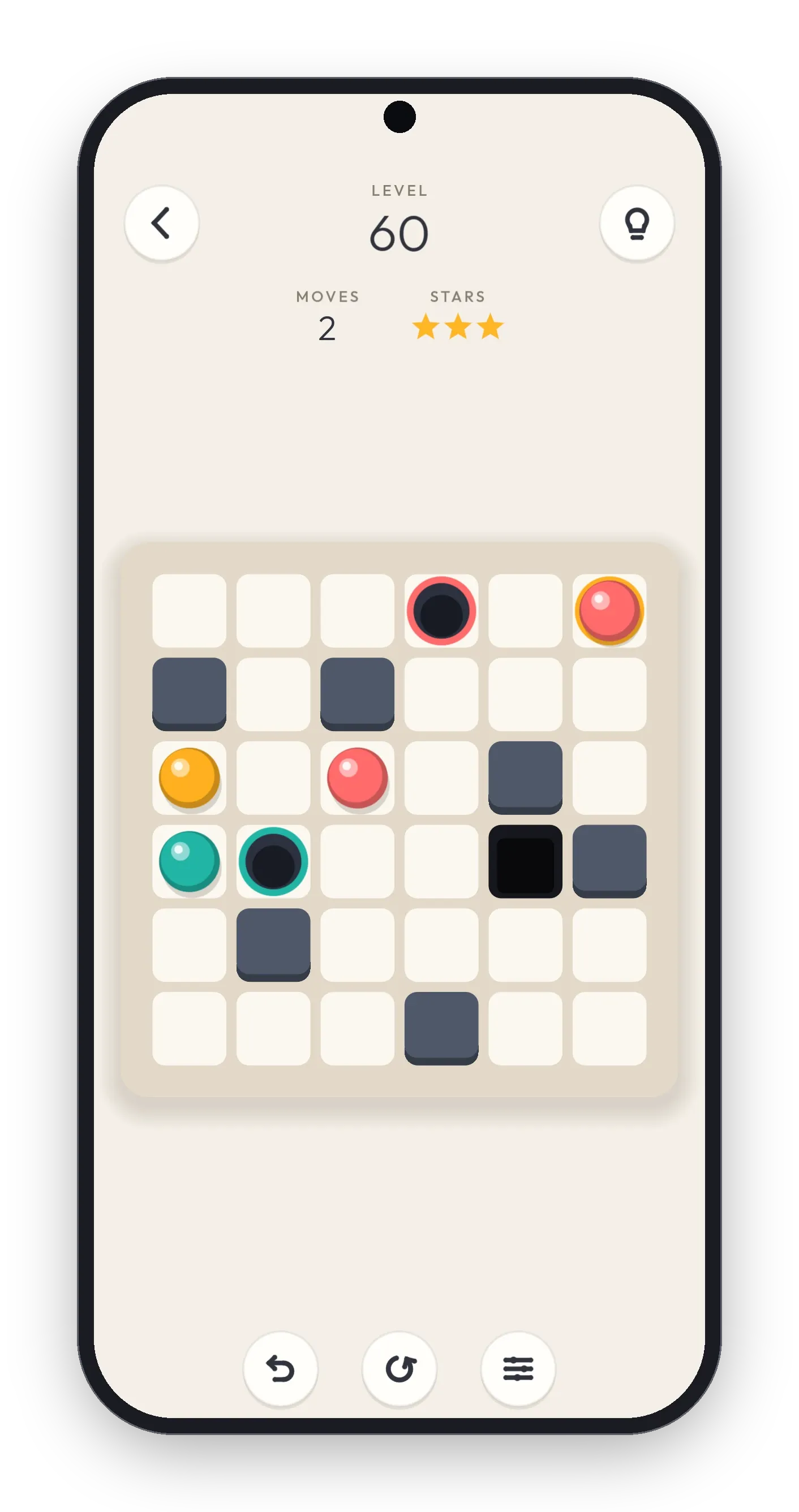 A Plumb level in play: marbles, walls and coloured holes on a paper board